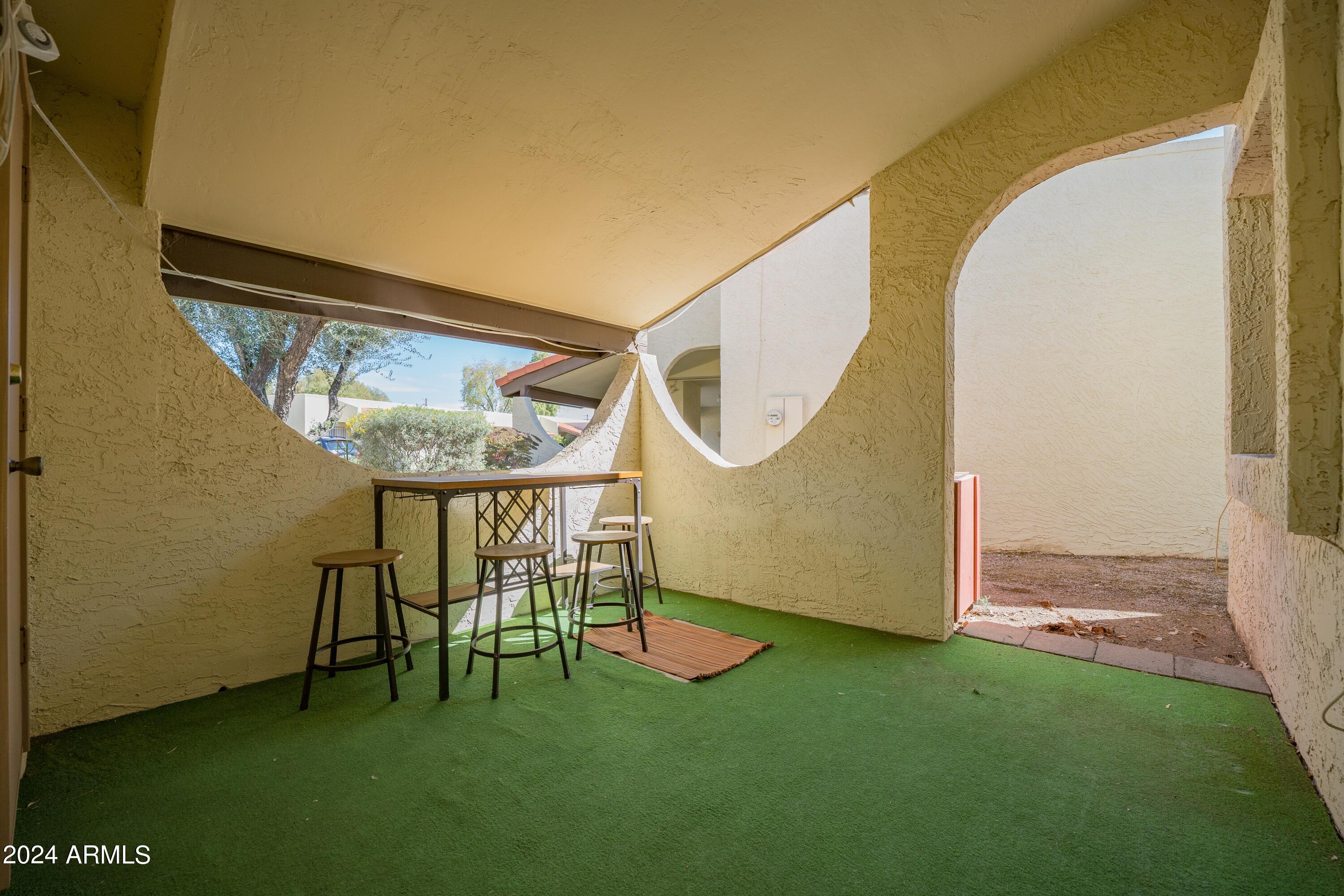 131 North Higley Road, Unit 12 Mesa, AZ 85205 - Photo 32 of 35 Front Covered Patio