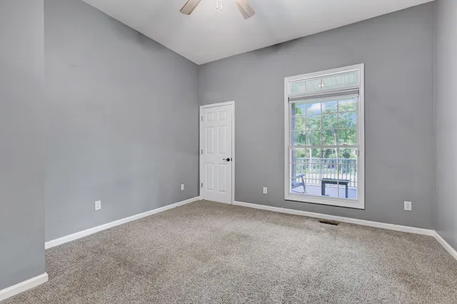 a kitchen with stainless steel appliances granite countertop white cabinets and a granite counter tops