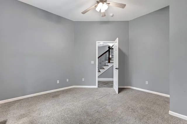 a kitchen with sink stove and refrigerator
