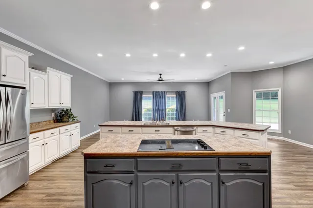a bath tub sitting next to a white toilet