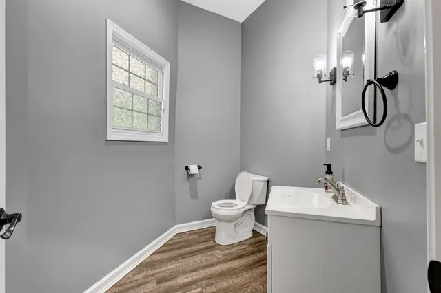 a view of a room with a ceiling fan