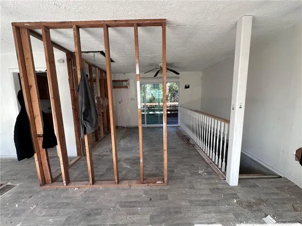 a view of kitchen with a refrigerator