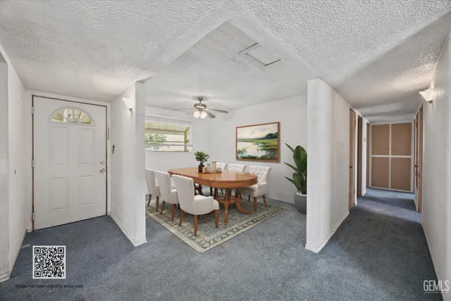 a view of a livingroom with furniture and window