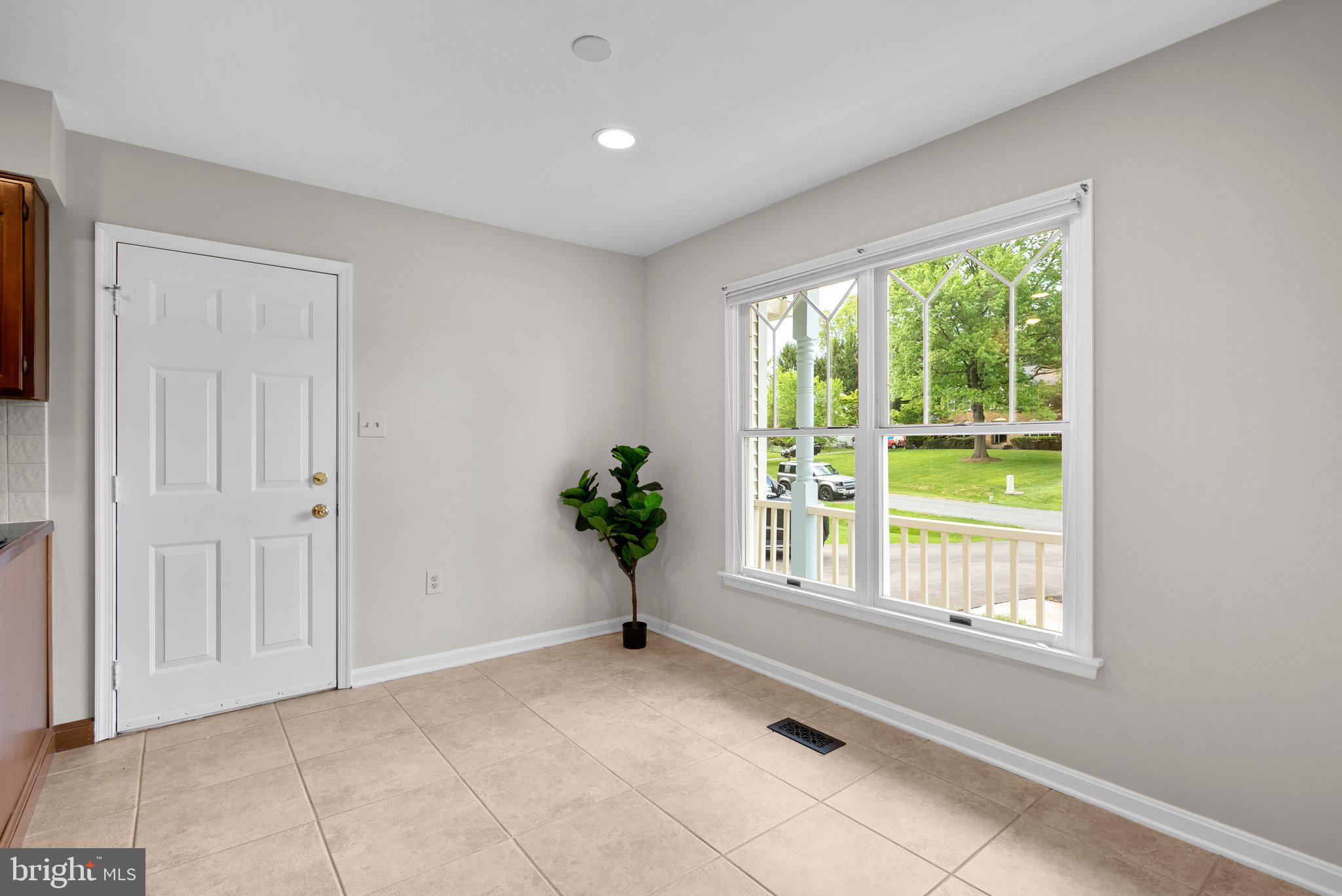 14620 Jaystone Drive Silver Spring, MD 20905 - Photo 16 of 52 a view of an empty room with a window