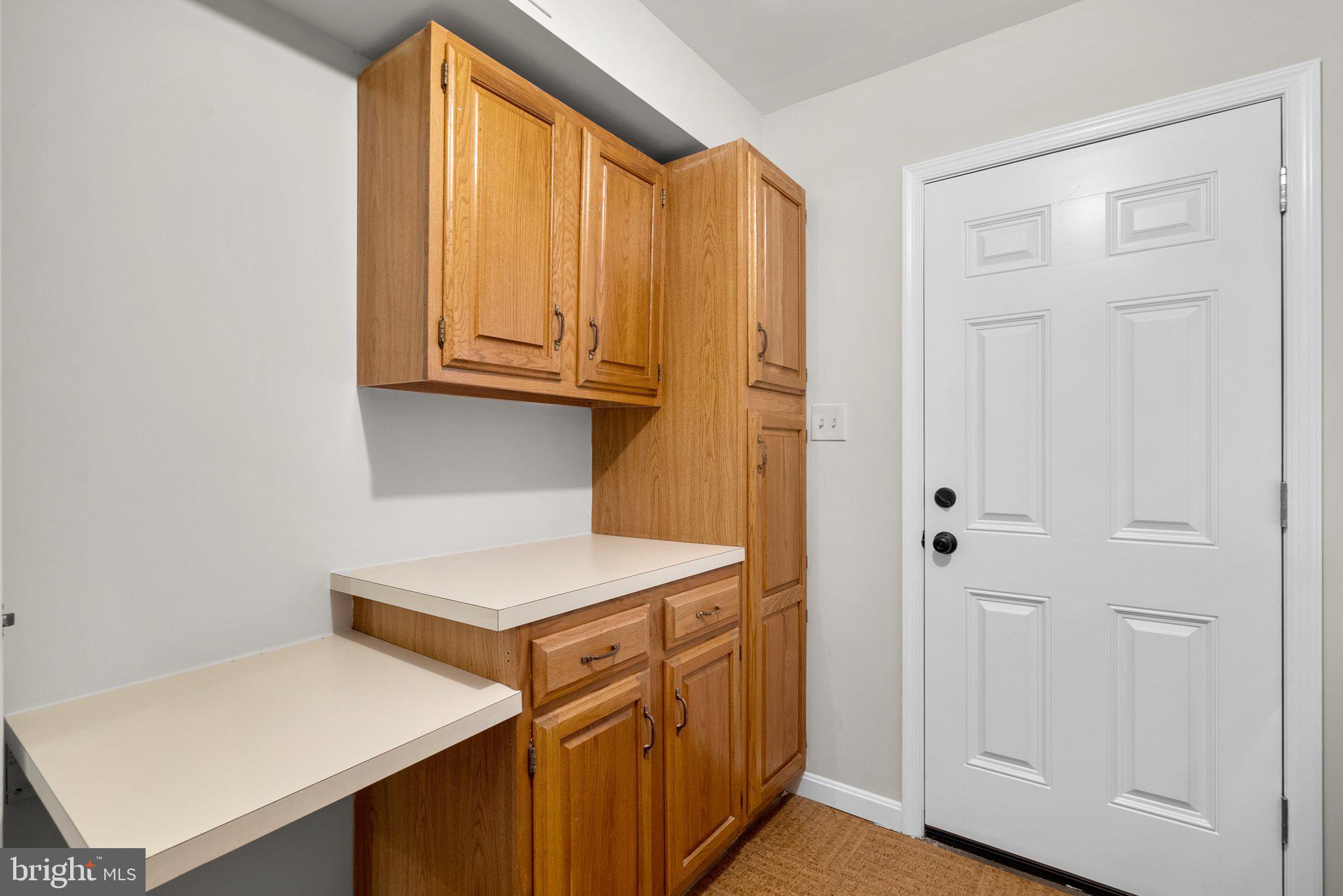 14620 Jaystone Drive Silver Spring, MD 20905 - Photo 24 of 52 a utility room with dryer and washer