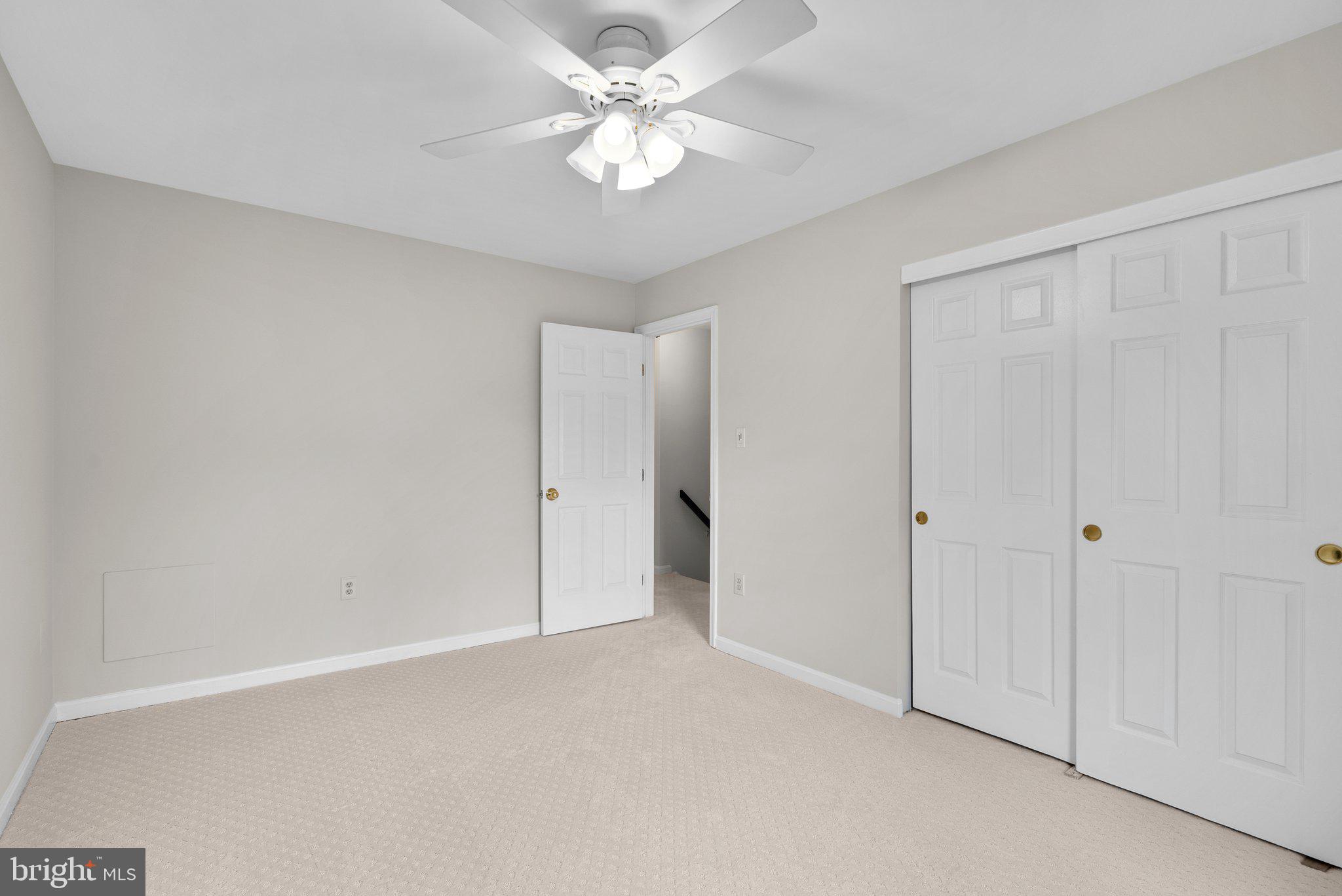 14620 Jaystone Drive Silver Spring, MD 20905 - Photo 32 of 52 a view of an empty room with a ceiling fan