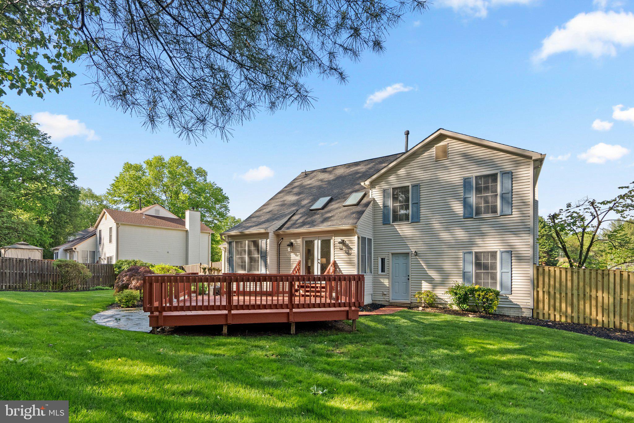 14620 Jaystone Drive Silver Spring, MD 20905 - Photo 48 of 52 a view of a house with a yard and deck