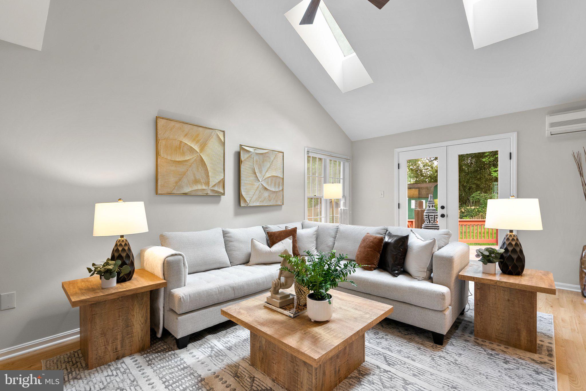 14620 Jaystone Drive Silver Spring, MD 20905 - Photo 6 of 52 a living room with furniture and a large window