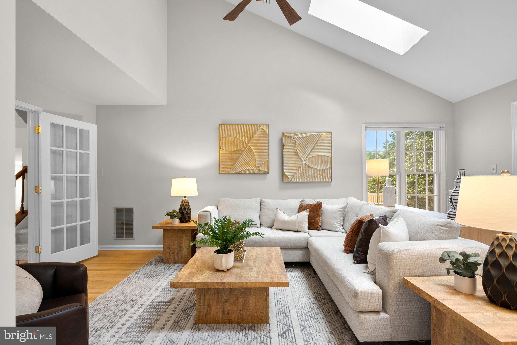 14620 Jaystone Drive Silver Spring, MD 20905 - Photo 7 of 52 a living room with furniture and a table