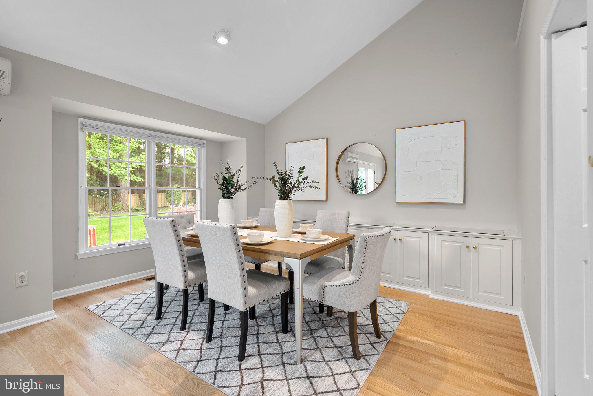 14620 Jaystone Drive Silver Spring, MD 20905 - Photo 10 of 52 a view of a dining room with furniture and a window