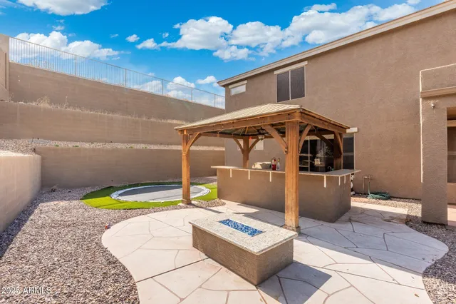 a house view with a outdoor space