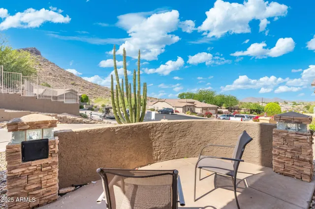 a view of balcony with furniture