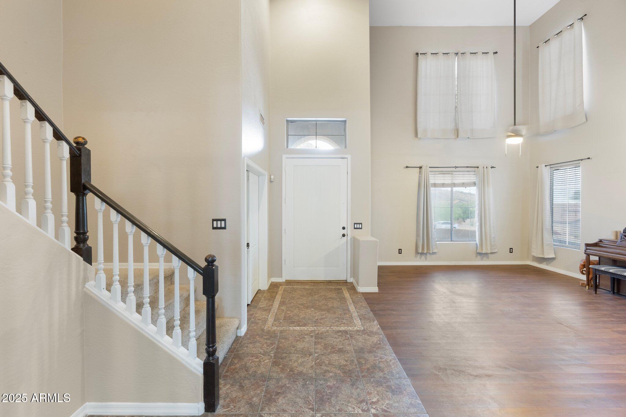 6202 West Maya Drive Phoenix, AZ 85083 - Photo 10 of 43 a view of an entryway with wooden floor