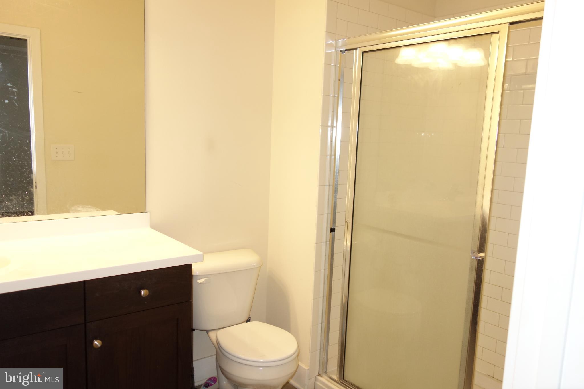 210 South Mill Road, Unit 203 Kennett Square, PA 19348 - Photo 4 of 5 Modern bathroom with sleek finishes.