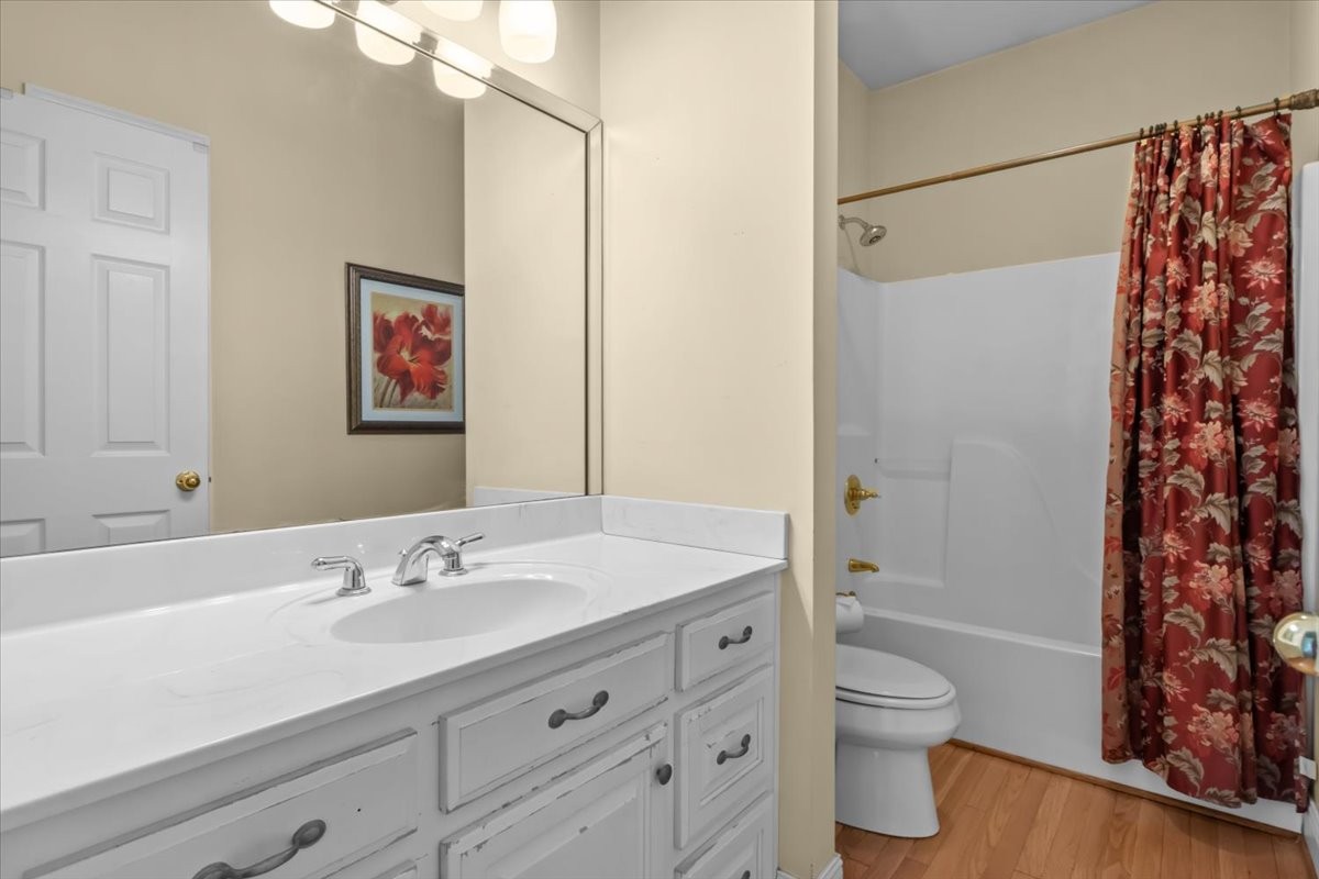 2440 Maple Grove Road Dickson, TN 37055 - Photo 30 of 99 a bathroom with a sink toilet and shower