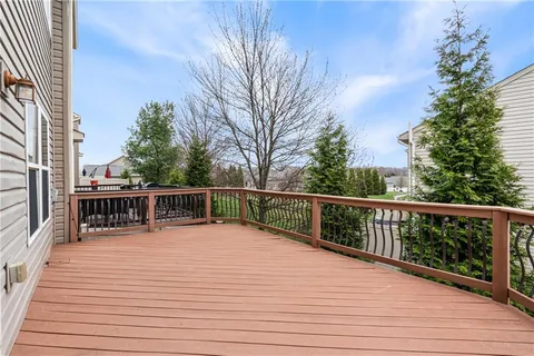 a view of balcony with seating space and trees