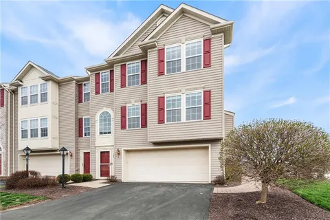 a view of a back yard of the house