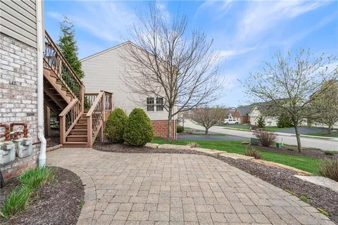 a view of a back yard of the house