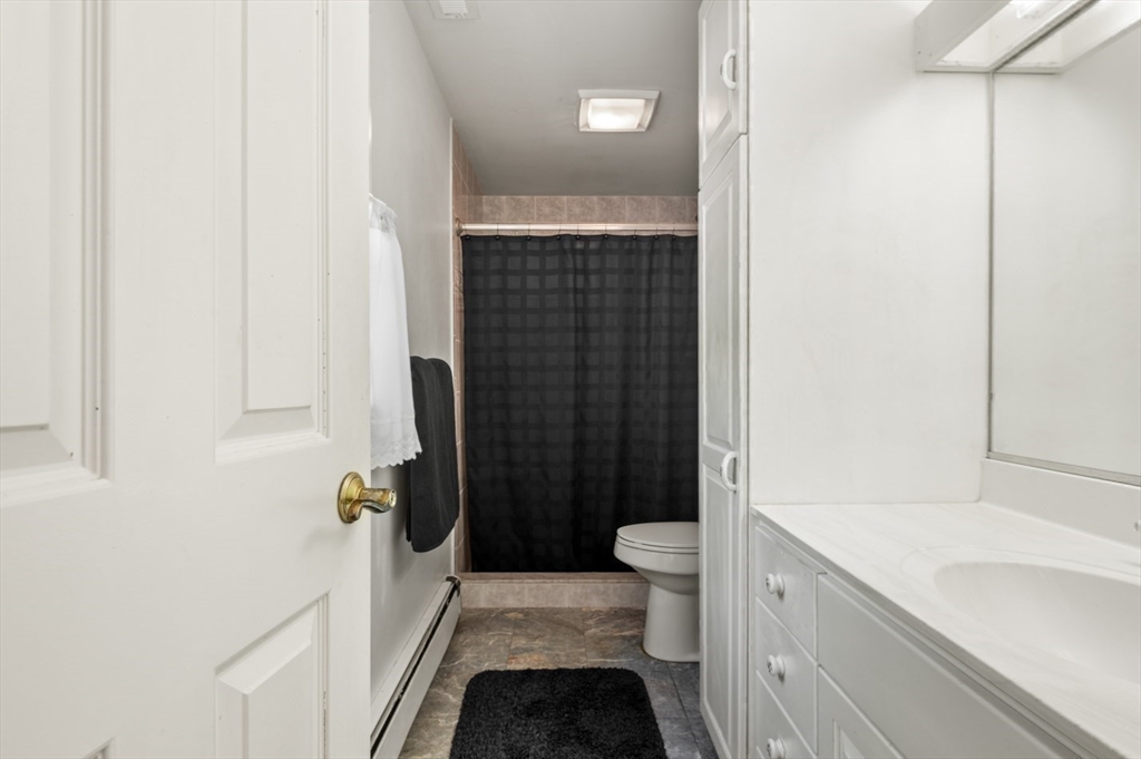 7 Bray Street Gloucester, MA 01930 - Photo 16 of 26 a bathroom with a sink and toilet