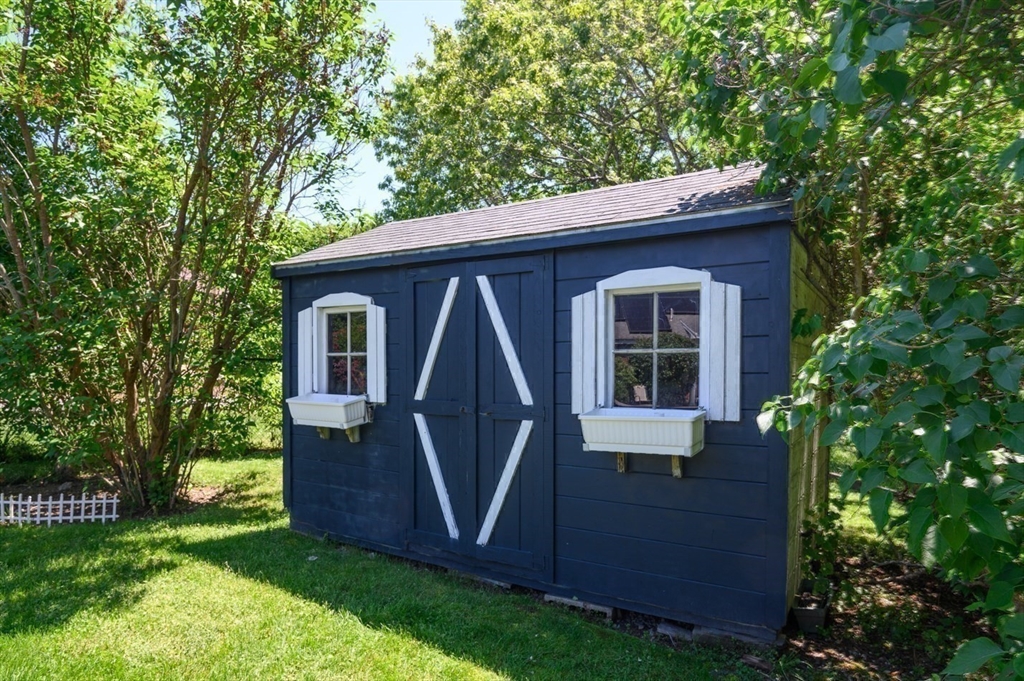 7 Bray Street Gloucester, MA 01930 - Photo 22 of 26 a front view of a house with garden