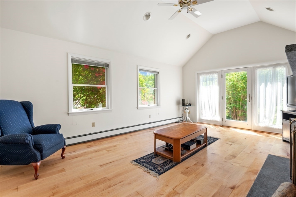 7 Bray Street Gloucester, MA 01930 - Photo 8 of 26 a living room with furniture and a large window