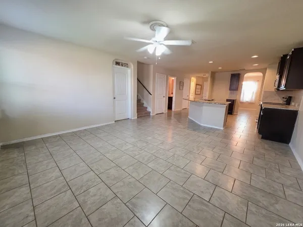 a view of a bathroom with a shower and a sink