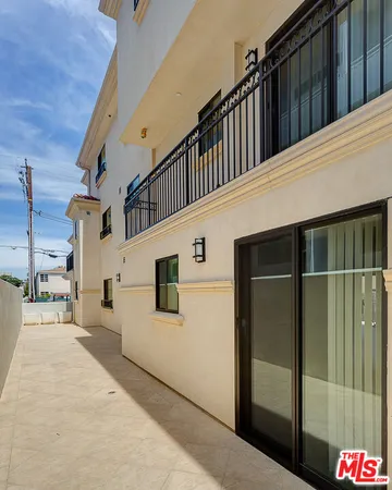 a view of a building with a balcony
