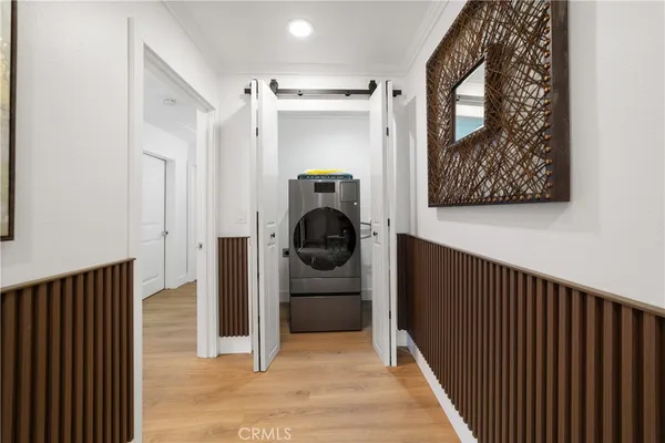 a spacious bathroom with a granite countertop sink mirror and vanity
