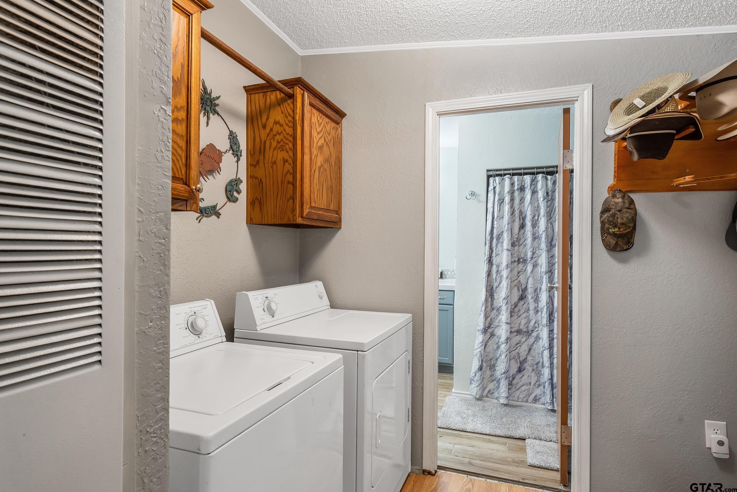 110 Sycamore Lane Murchison, TX 75778 - Photo 25 of 47 a utility room with dryer and washer