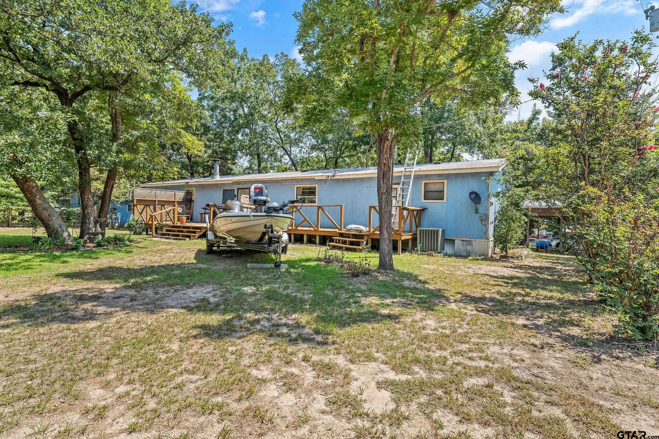 110 Sycamore Lane Murchison, TX 75778 - Photo 32 of 47 a view of a house with backyard