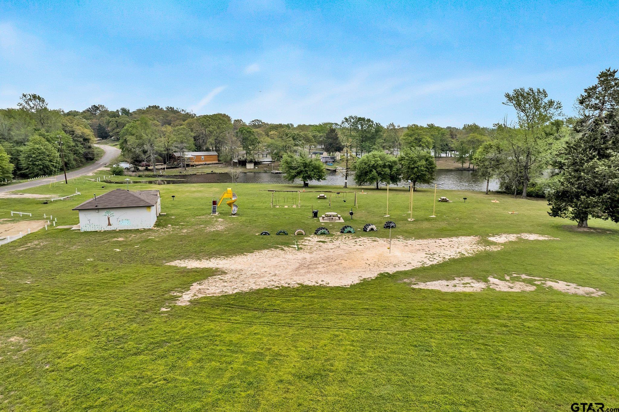 110 Sycamore Lane Murchison, TX 75778 - Photo 34 of 47 a view of a lake with a big yard