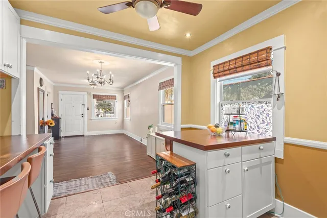 a kitchen with stainless steel appliances granite countertop a sink and a stove