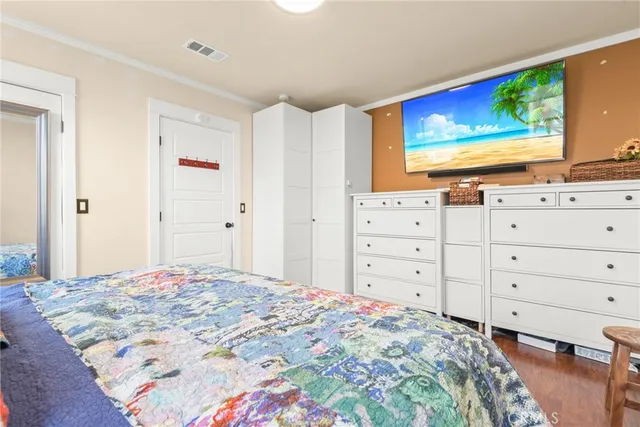 a bathroom with a sink vanity mirror and toilet