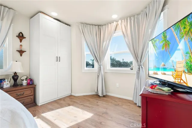 a building outdoor space with patio furniture and potted plants