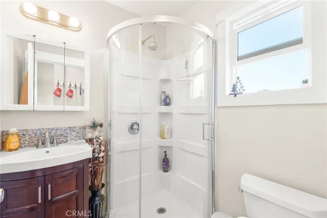 a view of a two chairs in the patio