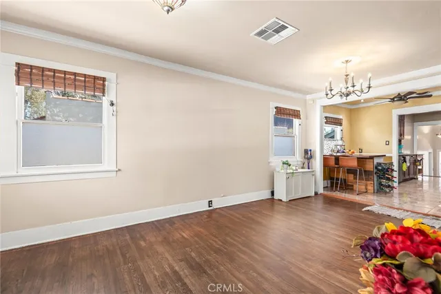 a room with a table and chairs