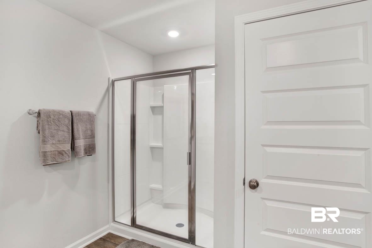 1235 Hayward Loop Foley, AL 36535 - Photo 21 of 26 Bathroom with an enclosed shower