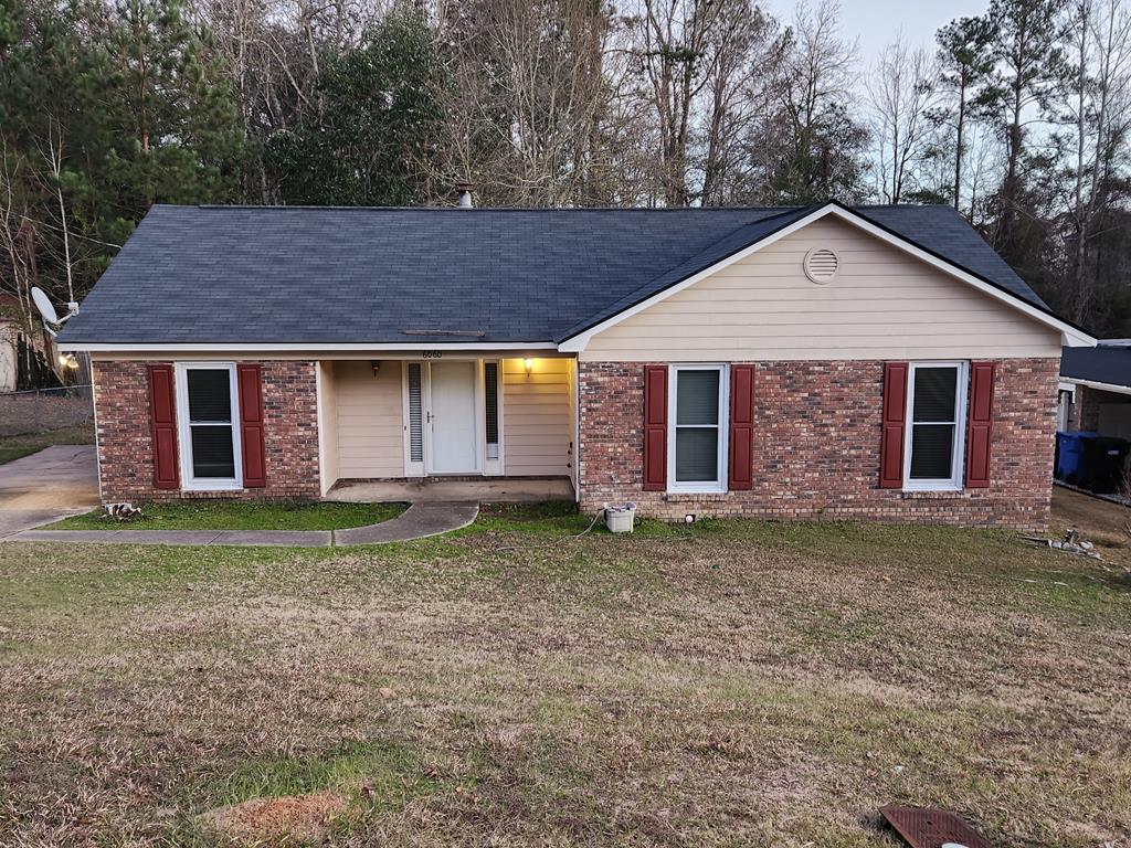 6060 Harvest Drive Columbus, GA 31907 - Photo 1 of 15 a view of a house with a yard and large tree