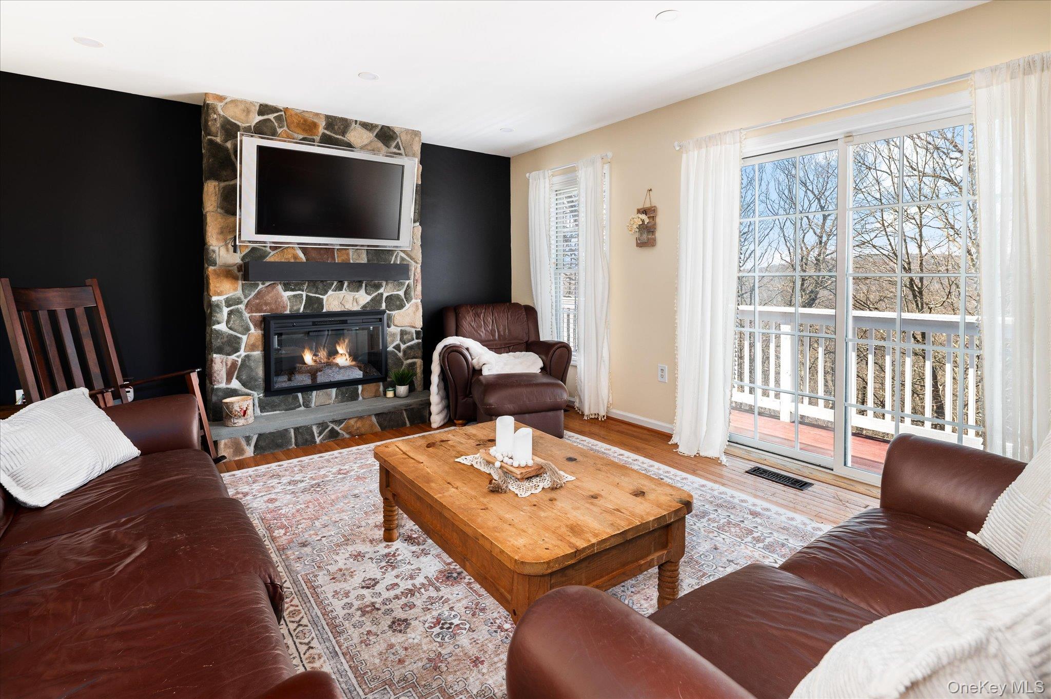 581 Barrett Hill Road Mahopac, NY 10541 - Photo 14 of 37 The fireplace that anchors the room