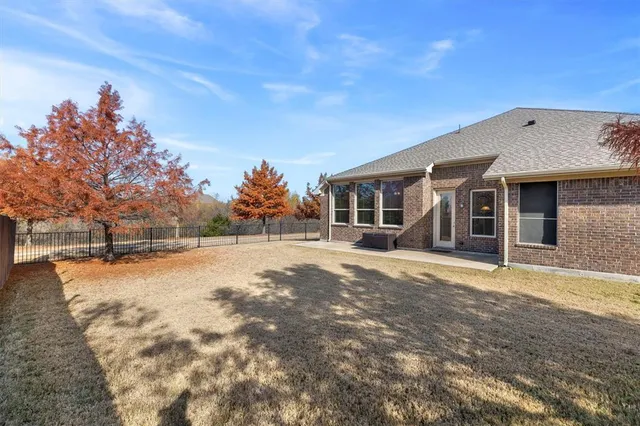 front view of a house with a big yard