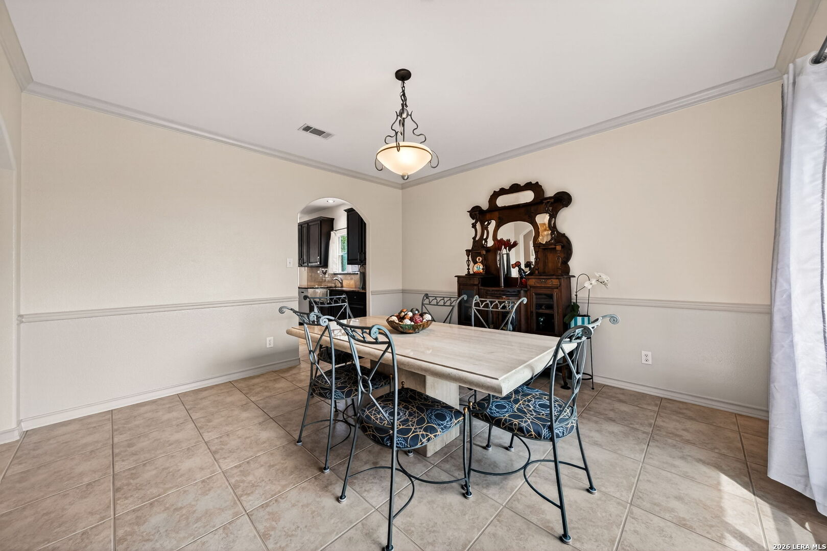 17431 Helotes Spring Road Helotes, TX 78023 - Photo 21 of 50 a view of a dining room with furniture wooden floor and chandelier