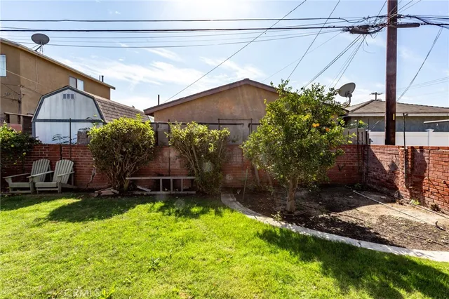 a house view with a garden space