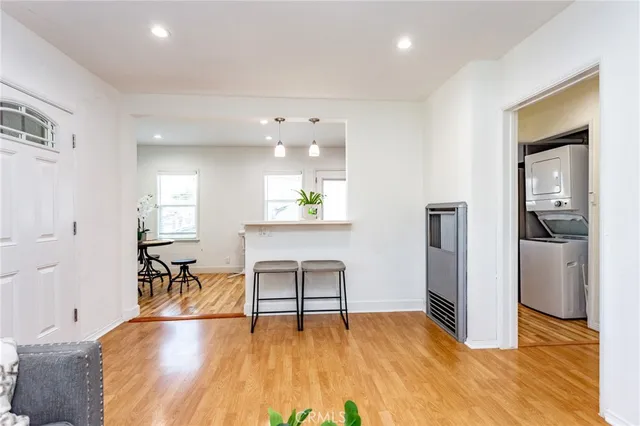 a view of a kitchen and dining room