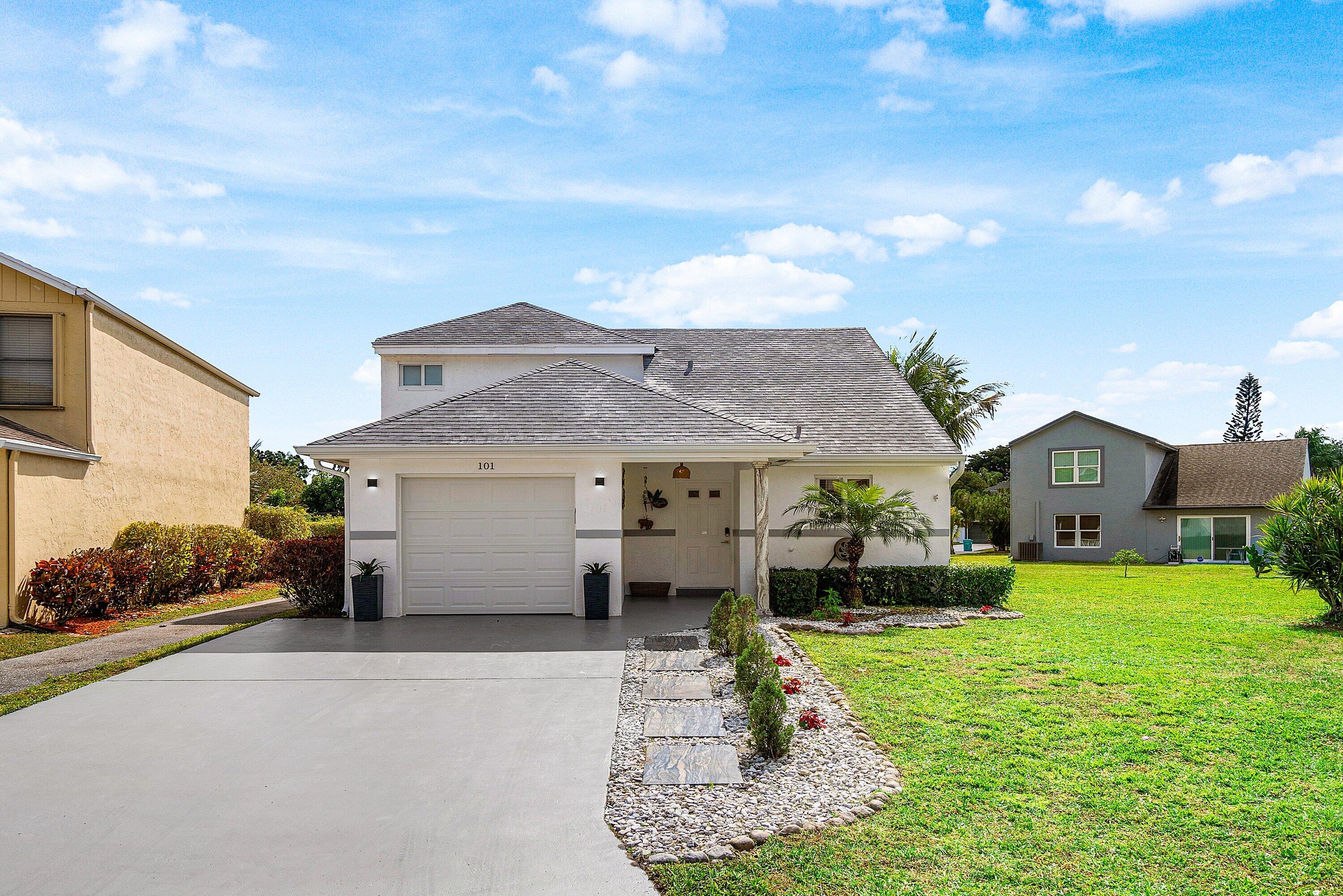 101 Azalea Circle Boynton Beach, FL 33436 - Photo 1 of 40 001-101AzaleaCircle-BoyntonBeach-FL-3343