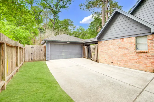 a house view with a garden space