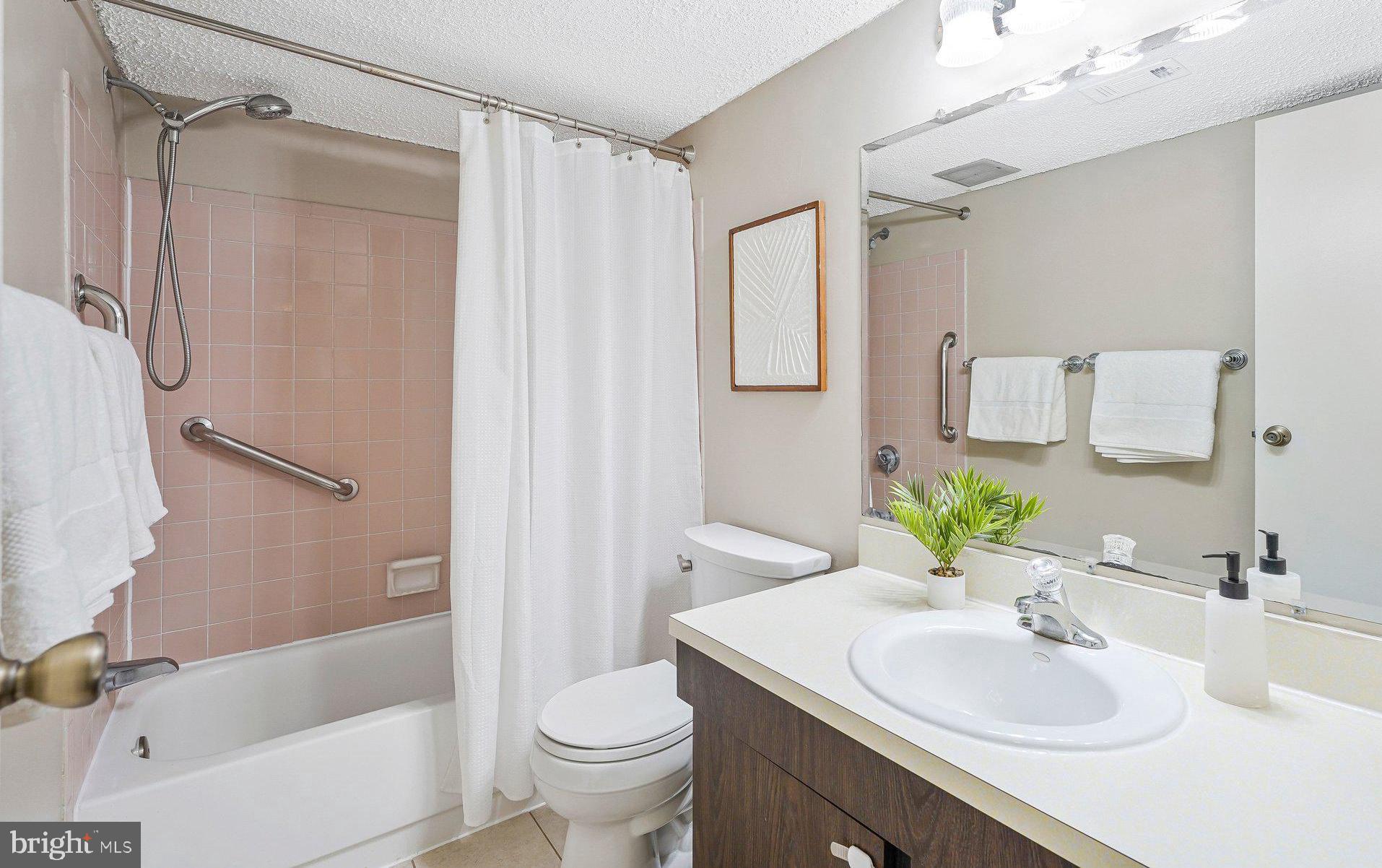 11804 Breton Court, Unit 1A Reston, VA 20191 - Photo 12 of 19 Full Hall Bathroom