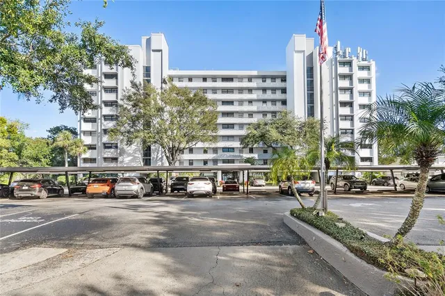 a view of a city street lined with tall buildings