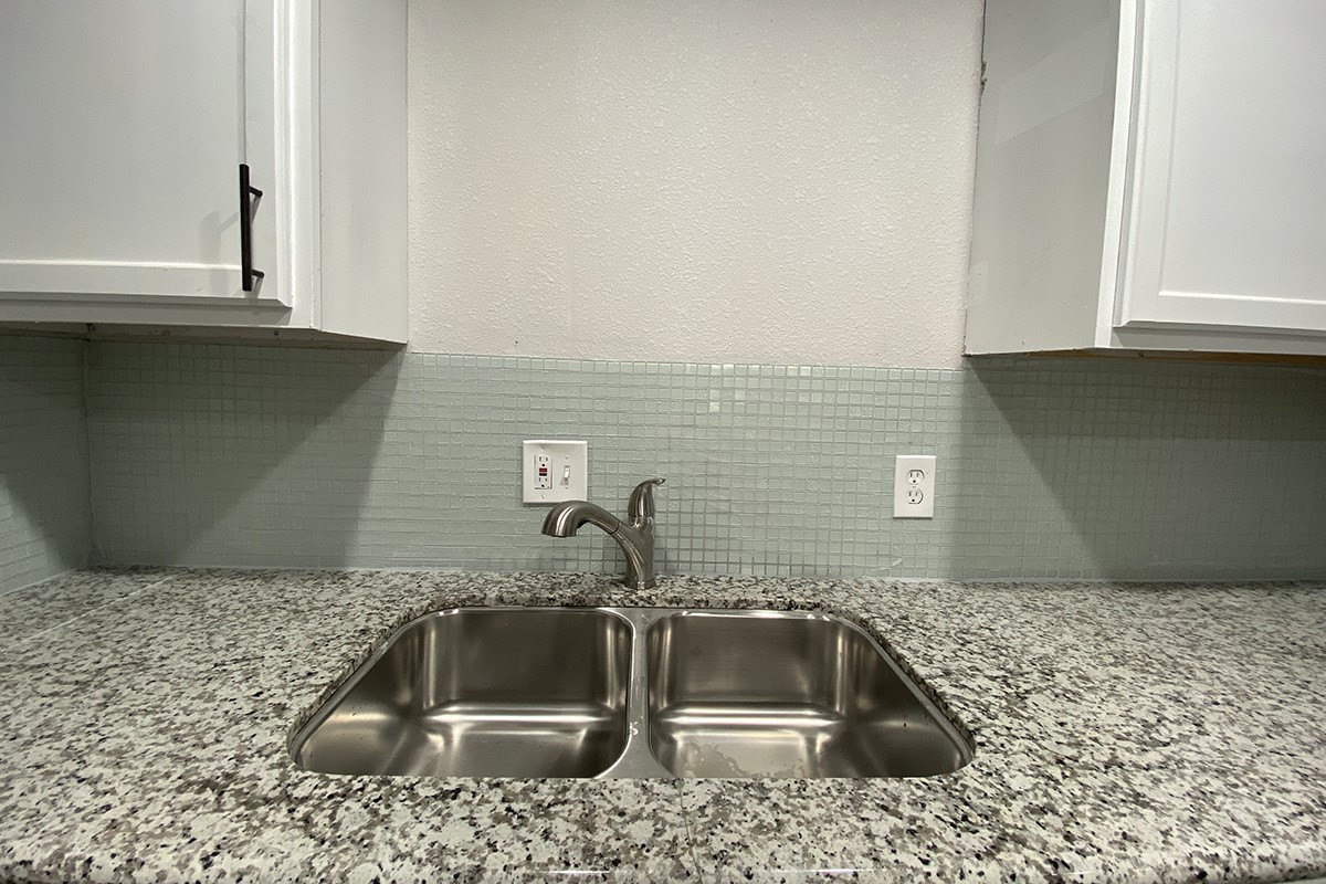 4601 Keystone Street Houston, TX 77021 - Photo 7 of 9 a kitchen with a sink and cabinets