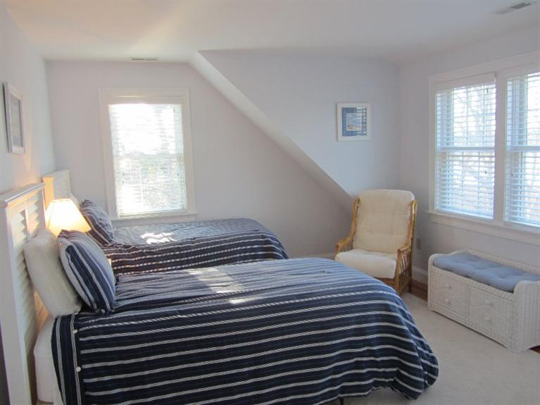 102 Marsh View Road Chatham, MA 02633 - Photo 17 of 23 a bedroom with a bed and a window