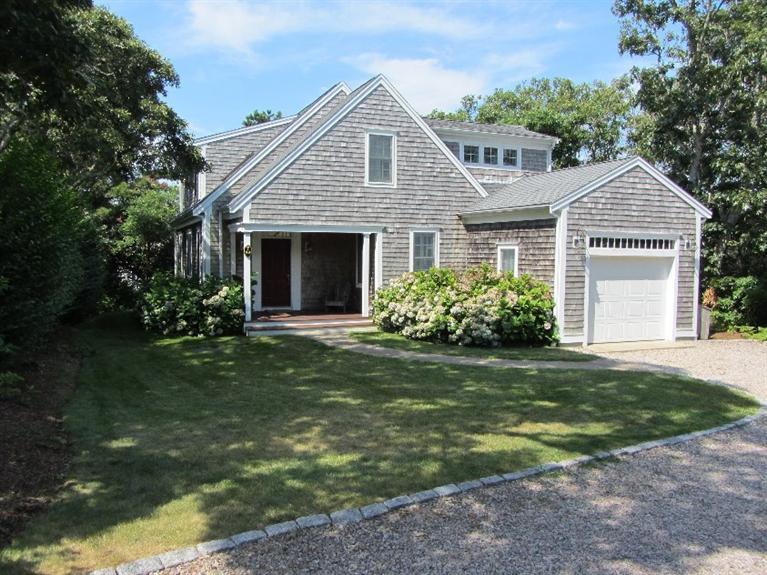 102 Marsh View Road Chatham, MA 02633 - Photo 2 of 23 a front view of a house with garden